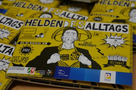 zu sehen ist das cover des Programmhefts